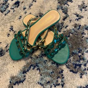 Emerald green studded scandal